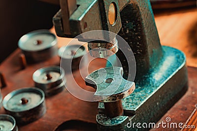 Close up on an old vintage bench press on a workbench Stock Photo