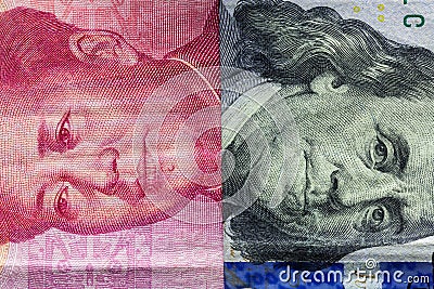 Close up of one hundred Dollar and 100 Yaun banknotes with focus on portraits of Benjamin Franklin and Mao Tse-tung/USA vs China t Stock Photo