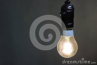 Close up one retro light lamp with copy space , bulb decorative in black background. Stock Photo