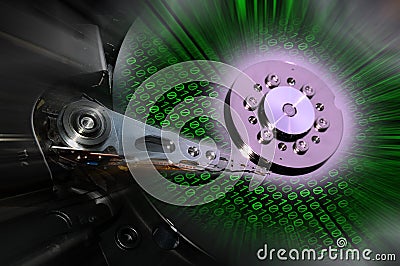 Close up of open computer hard drives with green binary code effects. background. Stock Photo