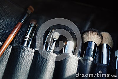 Close-up of open organizer with make-up brushes Stock Photo