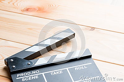 Close-up of an open video clapper on wooden boards view of a can Stock Photo