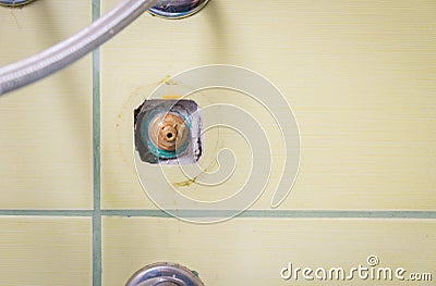 Close up of open water valve in the wall in the bathroom or kitchen after plumbing work of plumber for leakage Stock Photo