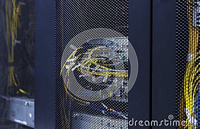 Close up optic cables and wires connection of cellular data terminal. Server equipment for cellular communication in the data Stock Photo