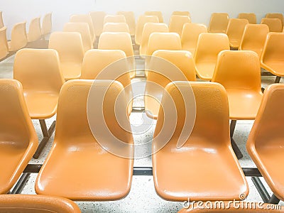 Close-up Orange Spectators seats at Office with copy space Stock Photo