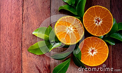 Close up organic fruit, honey orange juice on the wooden table with beautiful sunlight background in the garden at home. Stock Photo