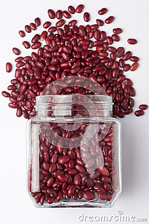 Close up of Organic Rajma, Laal Lobia or red kidney beans dal spilled and in a glass jar. Stock Photo