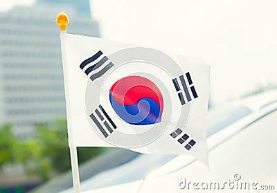 Close up ourdoors shot of South Korean flag on a flagpole Stock Photo