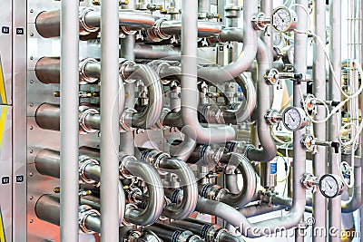 Close up outside tube with high precision industrial pressure gauge for water heater steam boiler temperature system Stock Photo