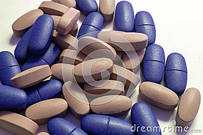Close-up. oval blue and gray tablets on a white background Stock Photo