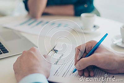 Close up overhead above top photo of man`s hands signing a contract contract business partnership real estate agent recruiter con Stock Photo