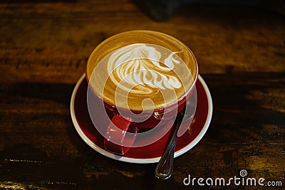 Close up overhead view of a cup of strong frothy coffee . Stock Photo