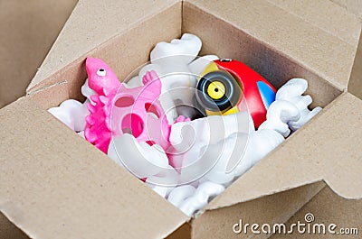 Close-up of package with toys ordered and received at home Editorial Stock Photo