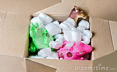 Close-up of package with toys ordered and received at home Stock Photo