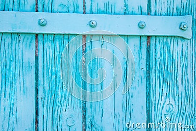 Close up of painted wooden gate in turquoise Stock Photo