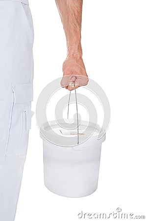 Close-up of a painter holding bucket Stock Photo