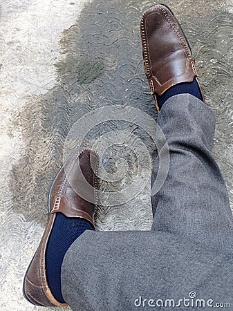 close-up of a pair of feet with shoes Stock Photo