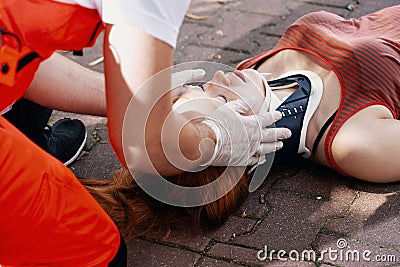 Paramedic helping a car accident victim Stock Photo