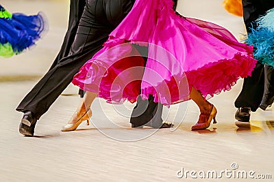 close-up part pink ball gown and and man black tail suit Stock Photo