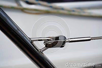Close up of part of sailboat rigging with rope and metal parts. Stock Photo