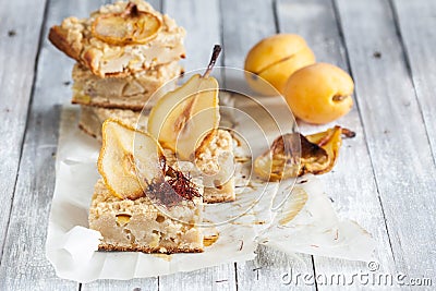 Close-up of pear pie with saffron and apricots Stock Photo