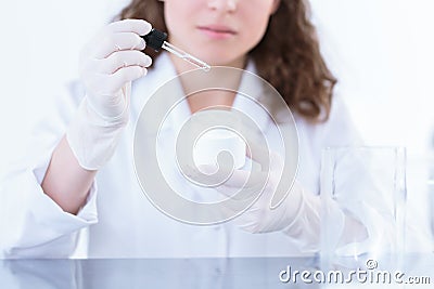 Person producing face cream Stock Photo