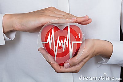 Person Protecting Heart Stock Photo