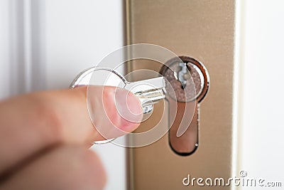 Hand Holding Broken Key Stock Photo