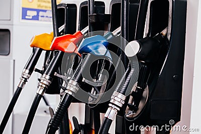 Close up of petroleum gasoline station service - oil refueling and refilling for car transportation concept. Stock Photo