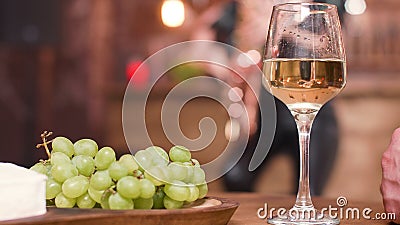 Close up pf wine glass on the table of a jazz club Stock Photo