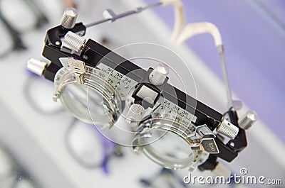 Close up of a phoropter inside the optical over a showcase in a blurred background Stock Photo