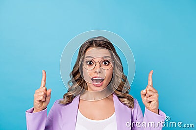 Close up photo astonished business lady indicate incredible ads promotion scream wow omg point finger wear violet blazer Stock Photo