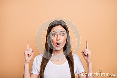 Close up photo astonished girl promoter point index finger up copyspace suggest select incredible sales option impressed Stock Photo