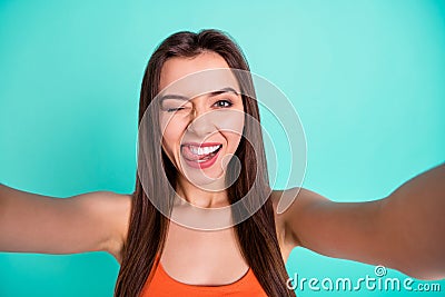 Close up photo beautiful amazing her she lady make take selfies tell speak say skype tongue out mouth blink one eye Stock Photo