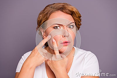 Close up photo beautiful amazing mature she her lady oh no facial expression hold hands arms cheek cheekbone terrible Stock Photo