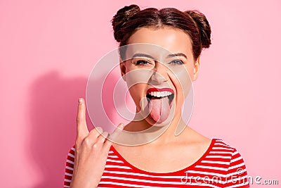 Close up photo beautiful carefree she her lady pretty hairdo two buns bright red pomade big lips tongue out mouth rocker Stock Photo