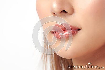 Close up photo with beautiful female face, Sexy plump full lips. Close-up face detail. Perfect natural lip makeup Stock Photo