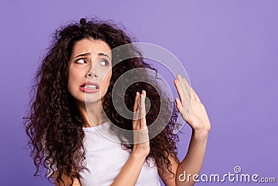 Close up photo beautiful her she lady hold arms hands side dislike disagreement I am sorry guys but no facial expression Stock Photo