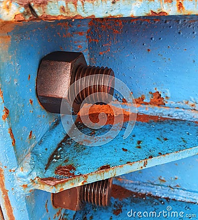 Close up photo of bolt and nut connection that joins steel plate for launcher gantry Stock Photo