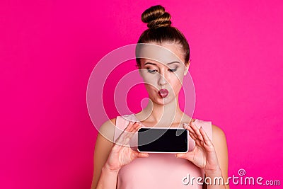 Close up photo of charming lady make photos video call live vlog blog air kiss blow dream dreamy dressed top-knot Stock Photo