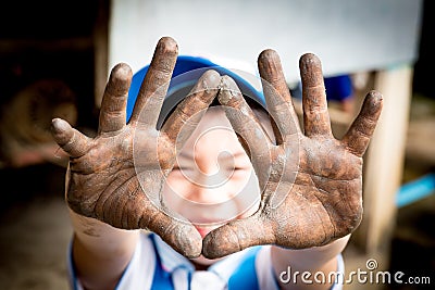 Close up photo of child hands in potter craft Stock Photo