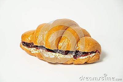 Close up photo of a croissant with stuffing on a white background Stock Photo