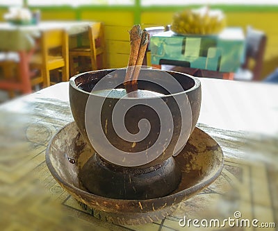 close up photo a cup of traditional coffee with palm sugar and cinnamons Stock Photo