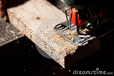 Close up photo of cutting wood with fretsaw. Stock Photo