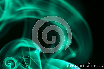 Green smoke on black background, smoky abstract background Stock Photo