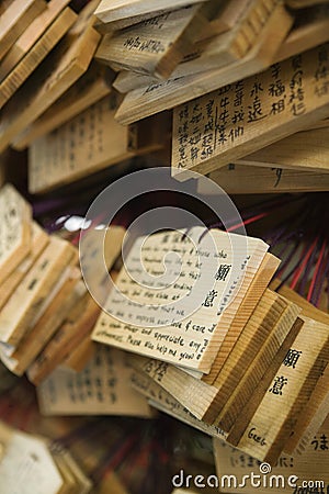 Japan Tokyo Meiji-jingu Shinto Shrine Small wooden plaques with prayers and wishes Ema Editorial Stock Photo
