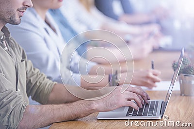 Close-up of man typing Stock Photo