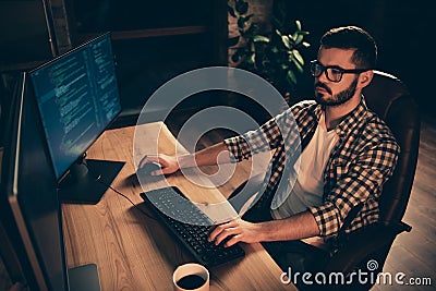 Close up photo not smiling handsome he him his guy coder typing php css keyboard development outsource IT processing Stock Photo