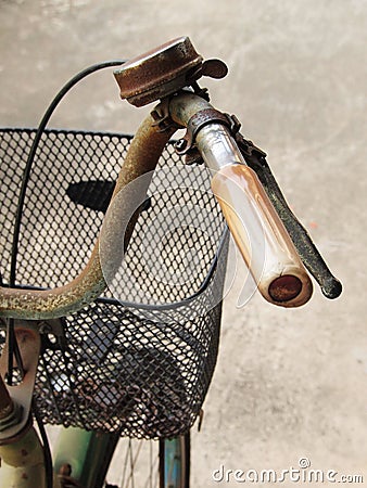 Close up photo of old, dirty and rusty bicycle handlebar. Stock Photo