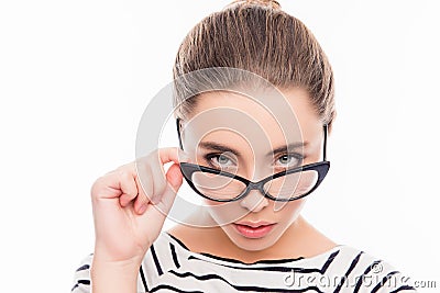 Close up photo of pretty smart girl touching her glasses Stock Photo